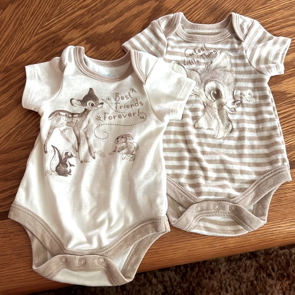 Two adorable NB Bambi onsies. Never been worn!